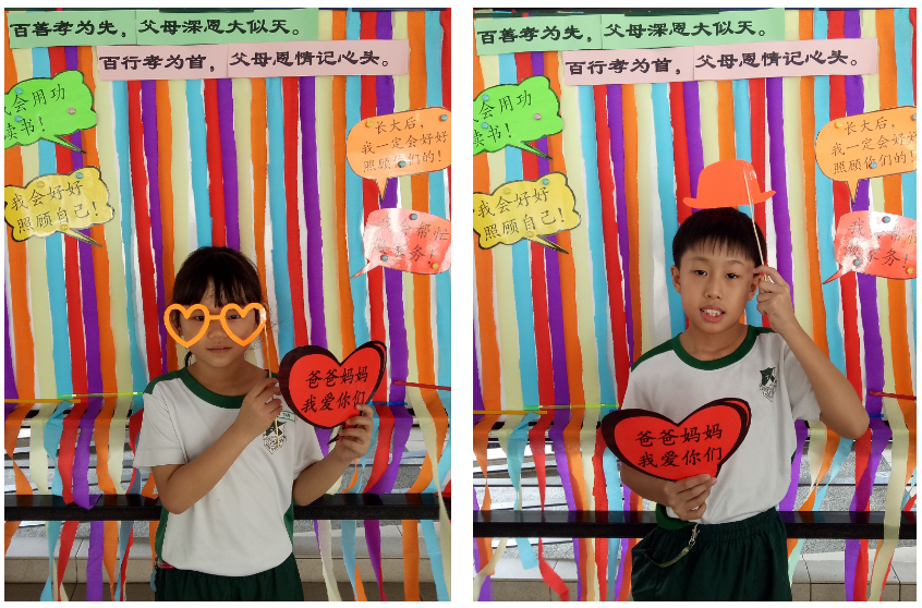 Students posing at the photo booth