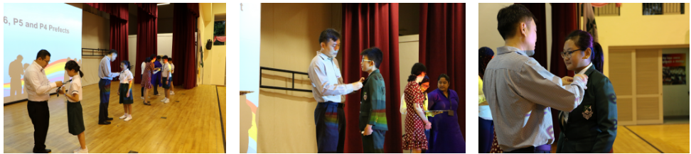 Our Principal and Vice-Principals pinning on the badges for the newly appointed Prefects.