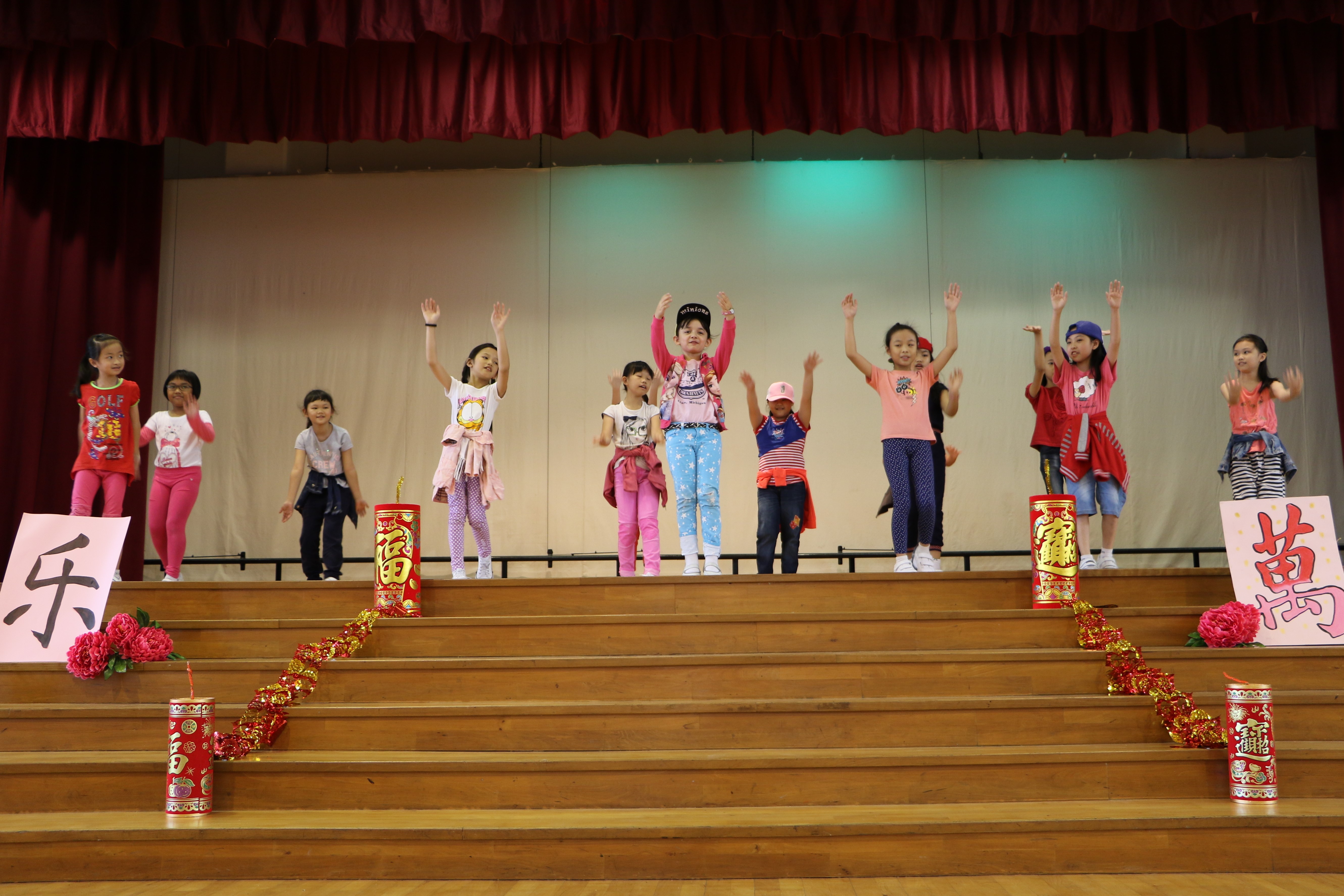 Primary 3 Students singing and dancing to an upbeat Chinese New Year song