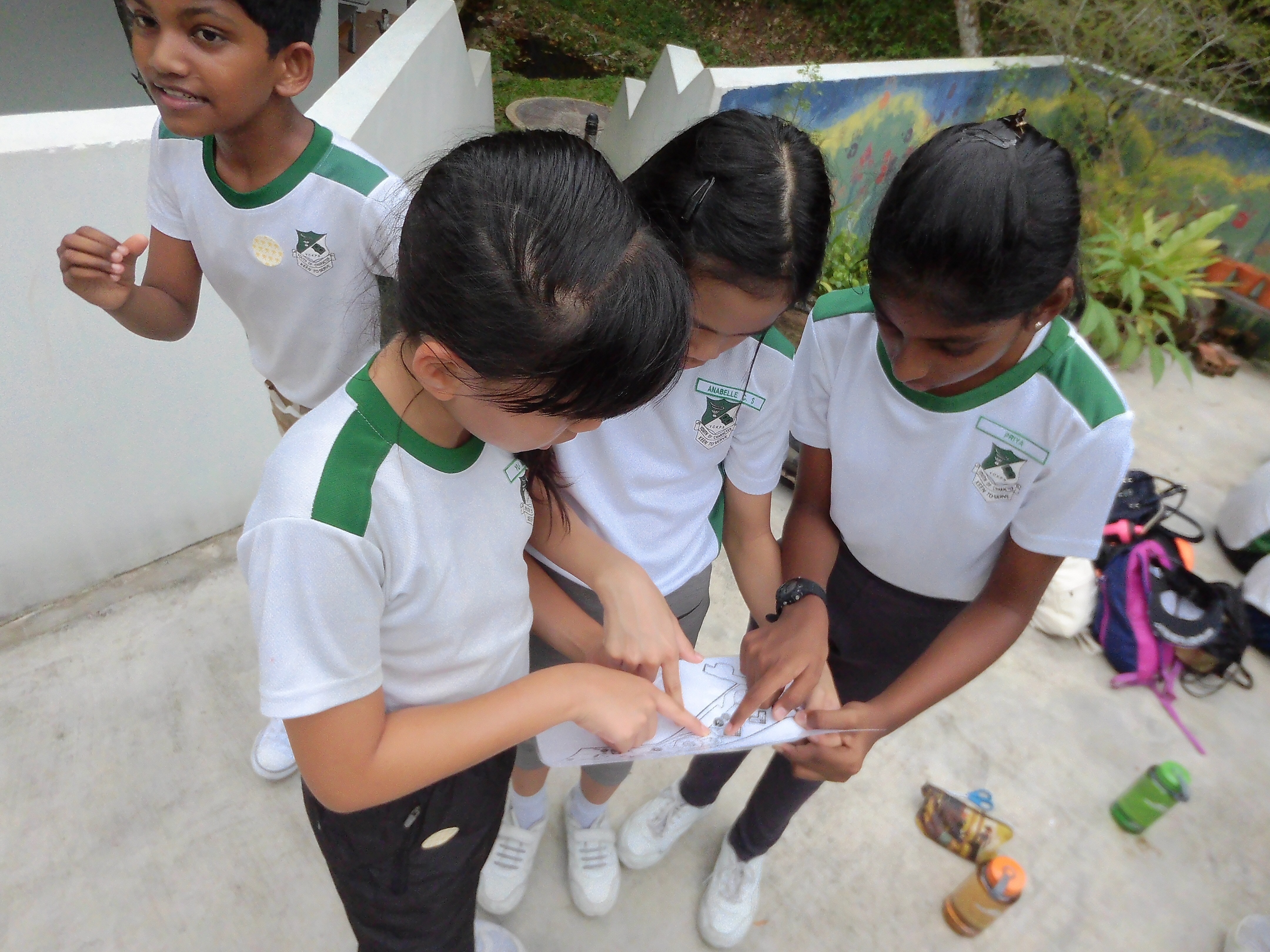 Applying navigation skills learnt in PE lesson during the camp.