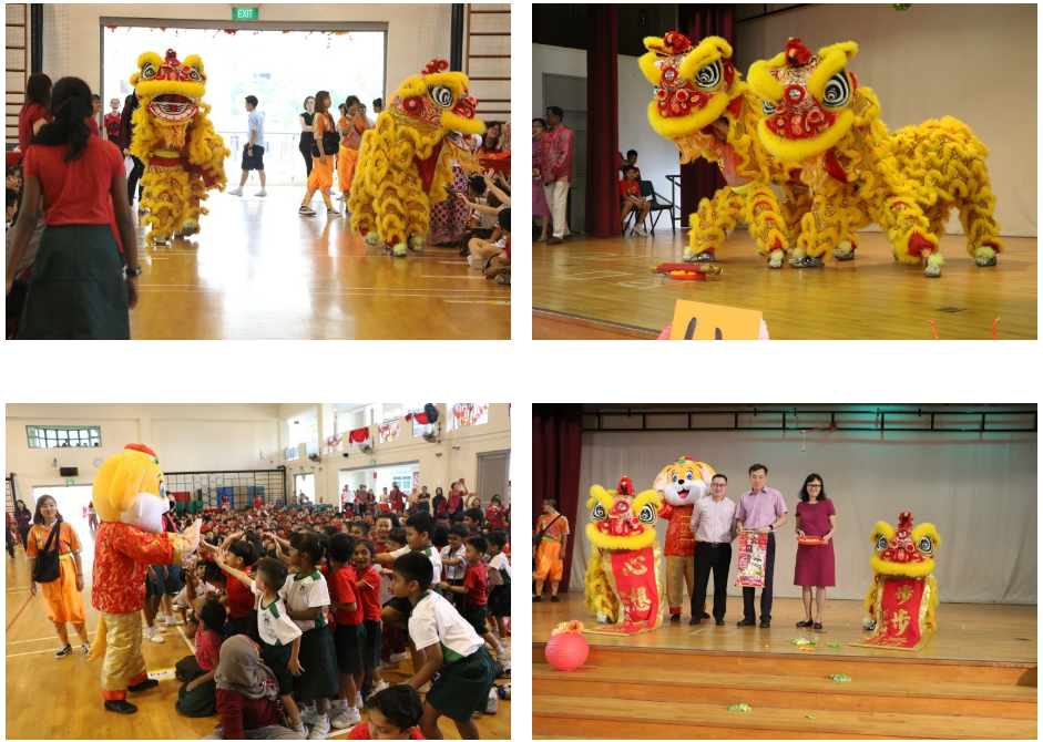 School leaders receiving the well wishes form lion dance troupe and the dog mascot.